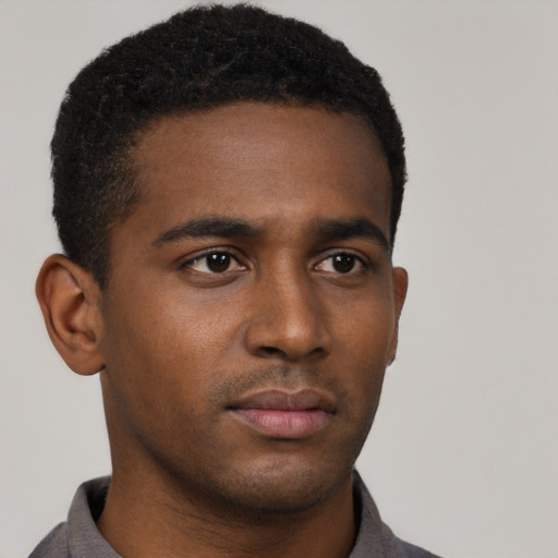 Neutral black young-adult male with short  brown hair and brown eyes