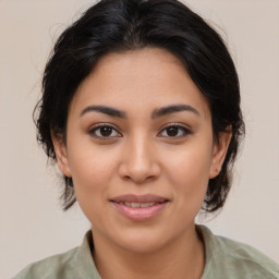 Joyful asian young-adult female with medium  brown hair and brown eyes