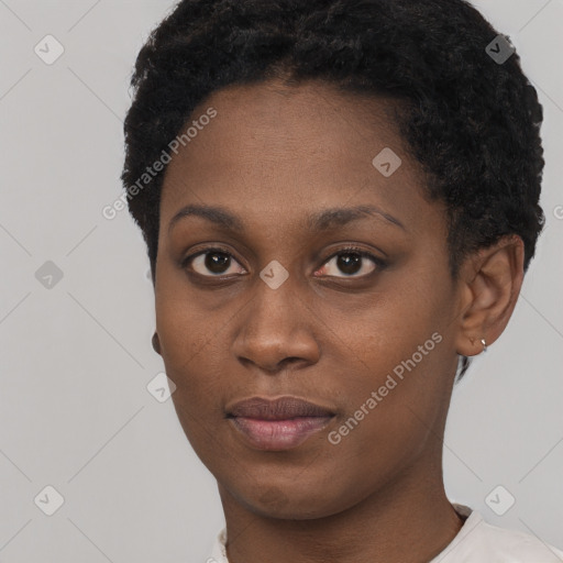 Neutral black young-adult female with short  black hair and brown eyes