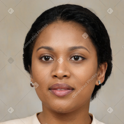 Joyful latino young-adult female with short  black hair and brown eyes