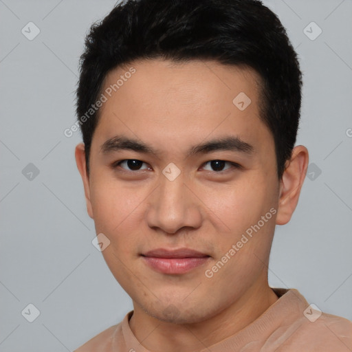 Joyful white young-adult male with short  black hair and brown eyes