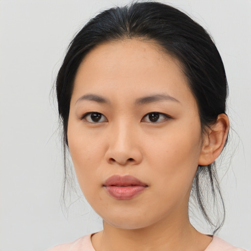 Neutral asian young-adult female with medium  black hair and brown eyes