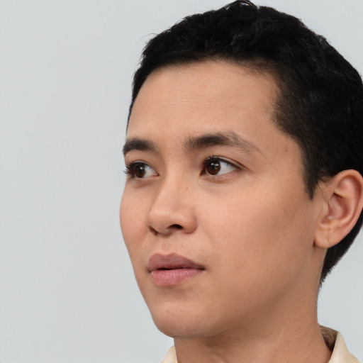 Neutral asian young-adult male with short  black hair and brown eyes