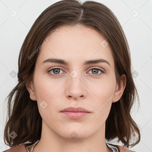 Neutral white young-adult female with medium  brown hair and grey eyes