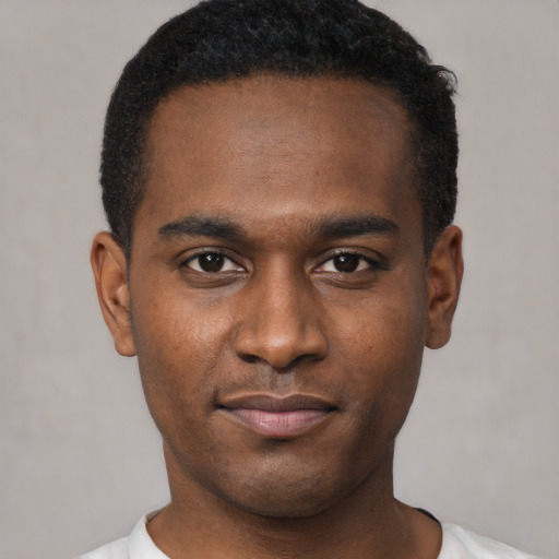 Neutral black young-adult male with short  black hair and brown eyes