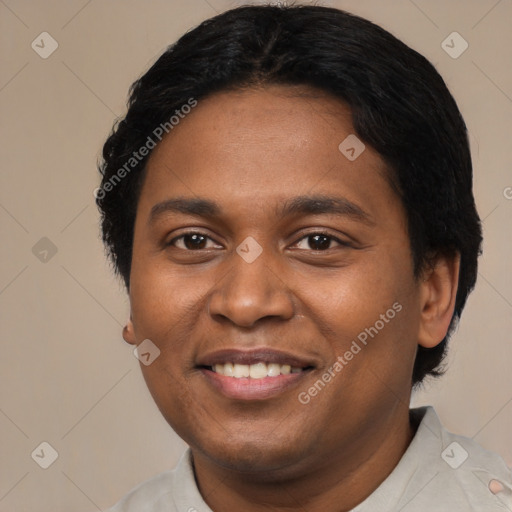 Joyful black young-adult male with short  black hair and brown eyes