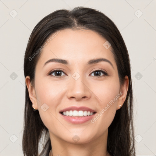 Joyful white young-adult female with long  brown hair and brown eyes