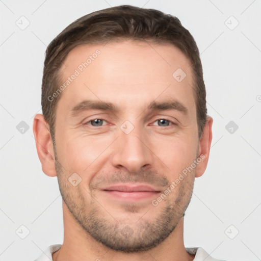 Joyful white young-adult male with short  brown hair and brown eyes