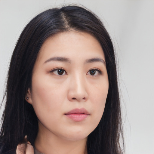 Neutral asian young-adult female with long  brown hair and brown eyes