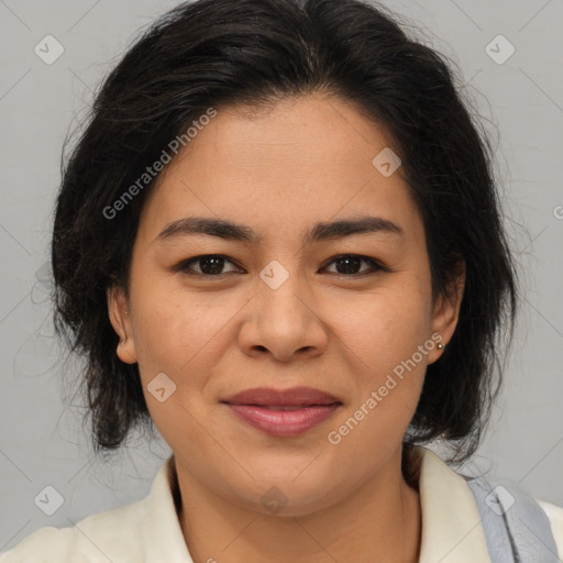 Joyful latino young-adult female with medium  brown hair and brown eyes