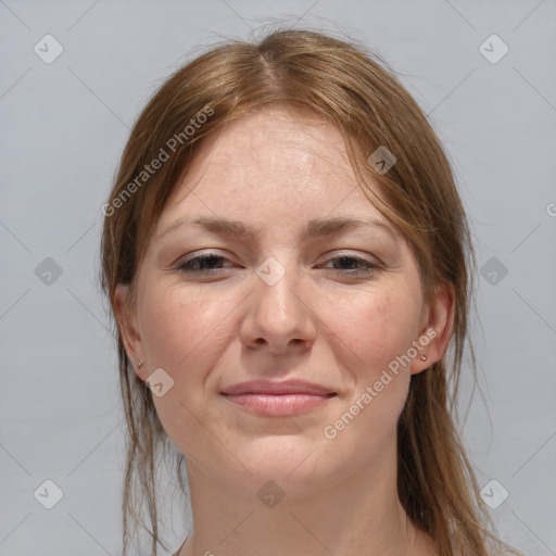 Joyful white adult female with medium  brown hair and grey eyes