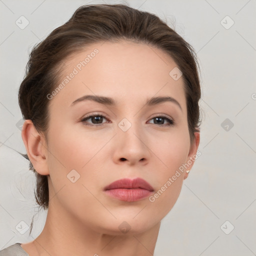 Neutral white young-adult female with short  brown hair and brown eyes