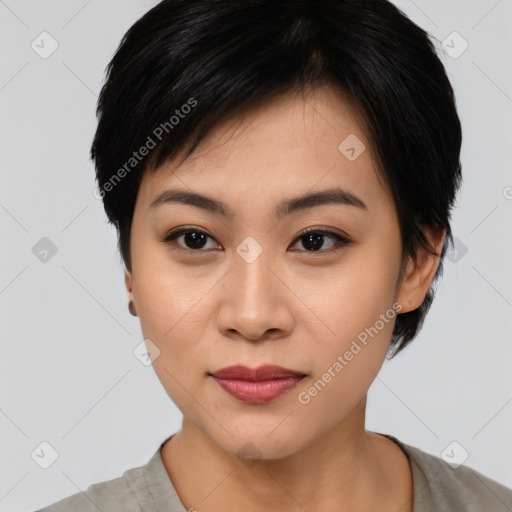 Joyful asian young-adult female with medium  black hair and brown eyes