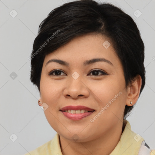 Joyful asian young-adult female with short  brown hair and brown eyes