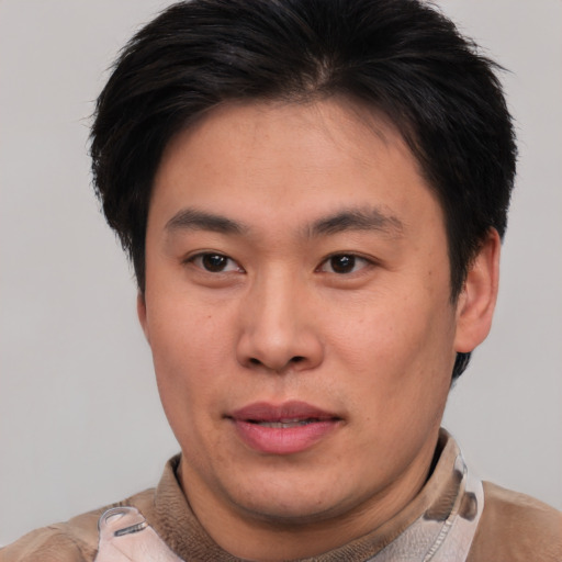 Neutral asian young-adult male with short  brown hair and brown eyes