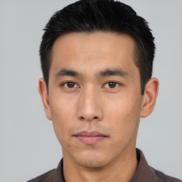 Neutral asian young-adult male with short  black hair and brown eyes