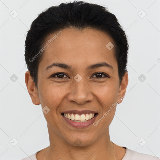 Joyful latino young-adult female with short  black hair and brown eyes