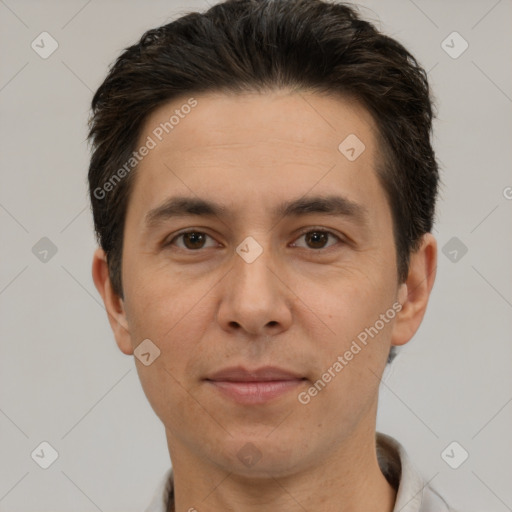 Joyful white adult male with short  brown hair and brown eyes