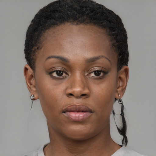 Neutral black young-adult female with short  brown hair and brown eyes