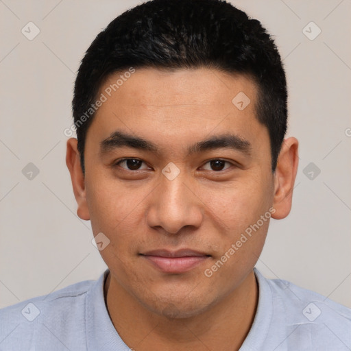 Joyful asian young-adult male with short  black hair and brown eyes