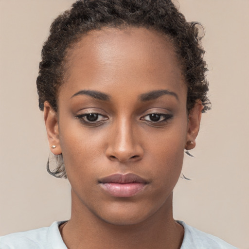 Neutral black young-adult female with short  brown hair and brown eyes