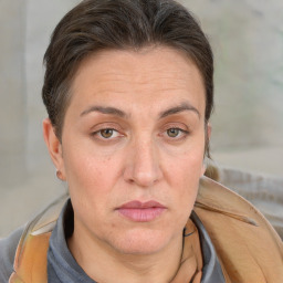 Neutral white adult female with short  brown hair and brown eyes