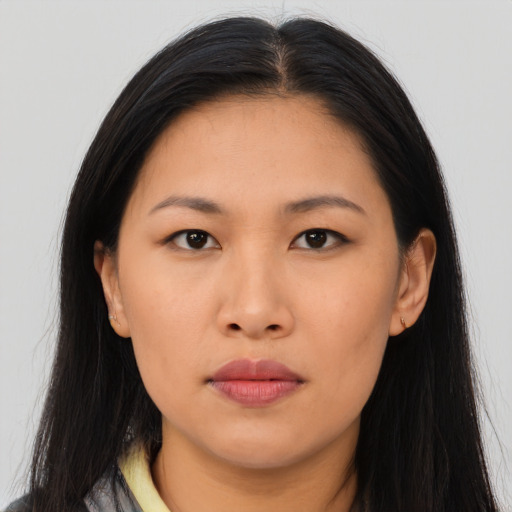Neutral asian young-adult female with long  brown hair and brown eyes