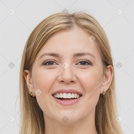 Joyful white young-adult female with long  brown hair and grey eyes