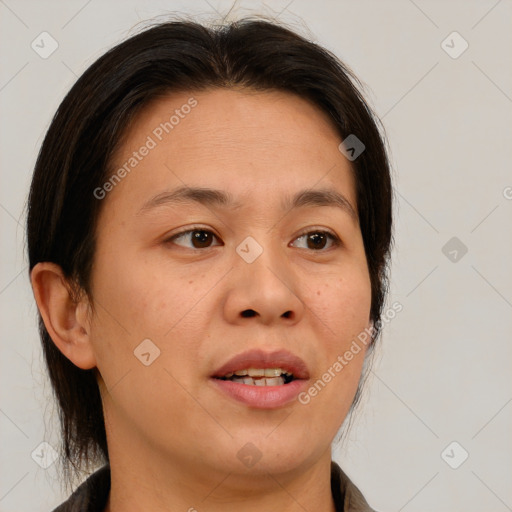 Joyful white adult female with medium  brown hair and brown eyes