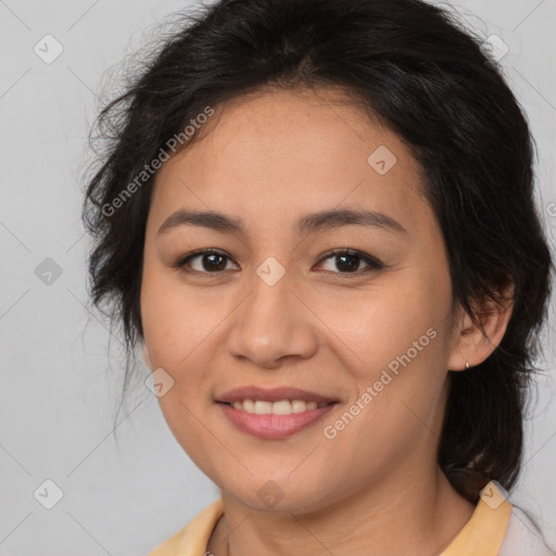 Joyful latino young-adult female with medium  brown hair and brown eyes