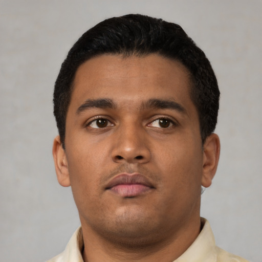 Neutral latino young-adult male with short  black hair and brown eyes