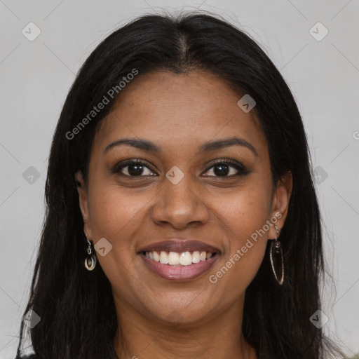 Joyful black young-adult female with long  brown hair and brown eyes