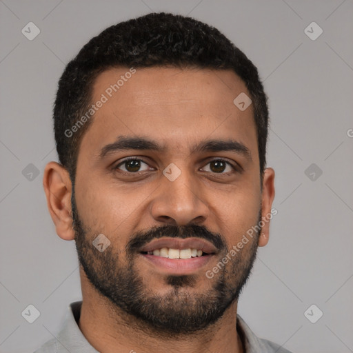 Joyful latino young-adult male with short  black hair and brown eyes