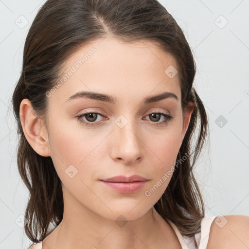 Neutral white young-adult female with medium  brown hair and brown eyes