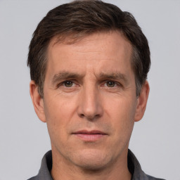 Neutral white adult male with short  brown hair and brown eyes