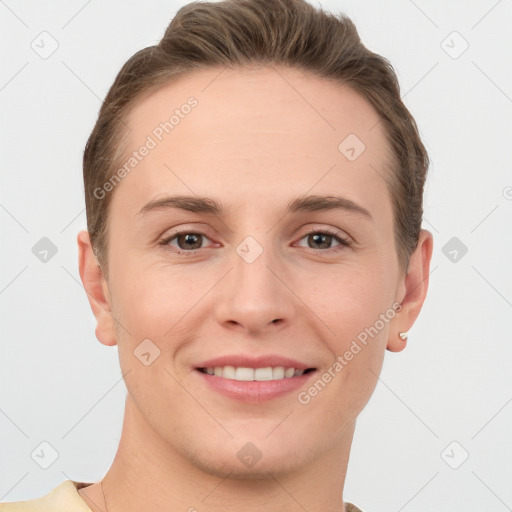 Joyful white young-adult female with short  brown hair and grey eyes