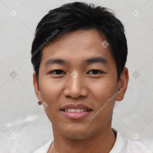 Joyful asian young-adult male with short  black hair and brown eyes