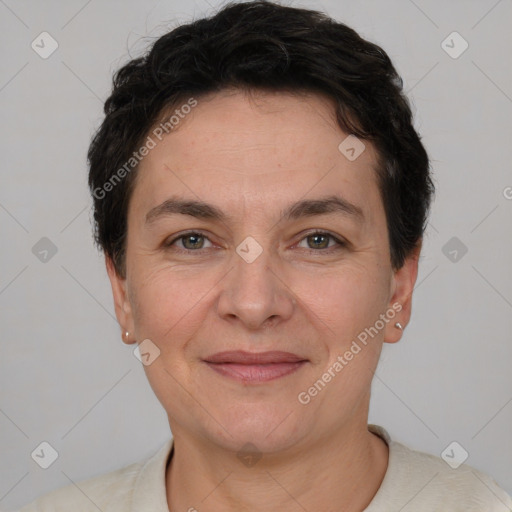 Joyful white adult female with short  brown hair and brown eyes