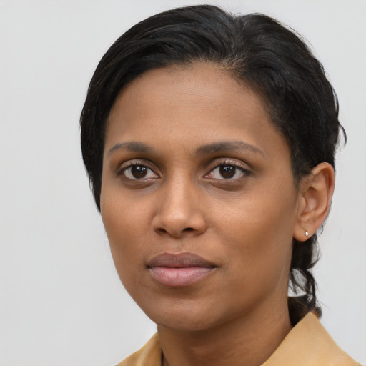 Neutral latino young-adult female with short  black hair and brown eyes