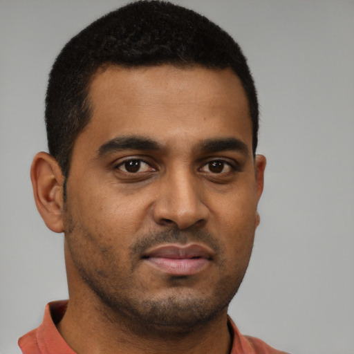 Neutral black young-adult male with short  brown hair and brown eyes
