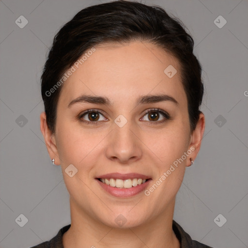 Joyful white young-adult female with short  brown hair and brown eyes