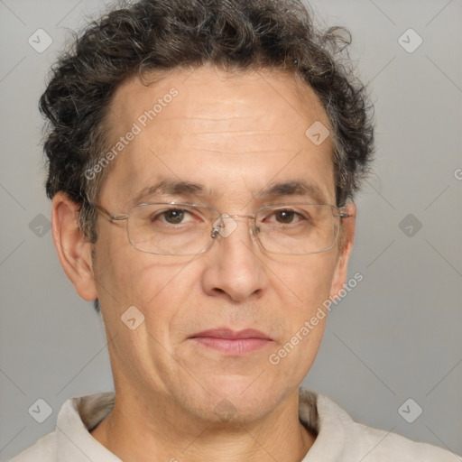 Joyful white middle-aged male with short  brown hair and brown eyes