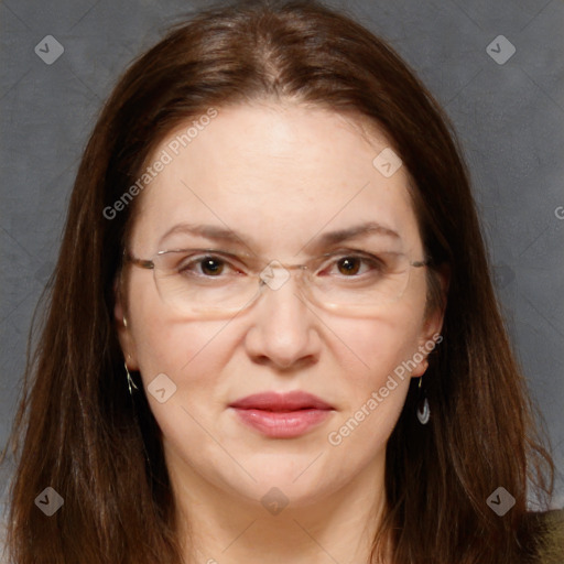 Joyful white adult female with long  brown hair and brown eyes