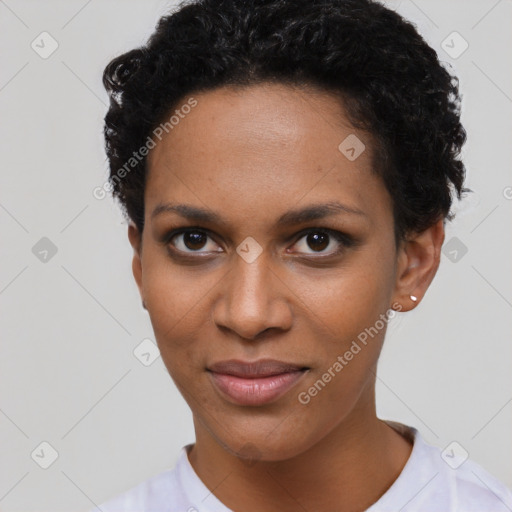 Joyful black young-adult female with short  brown hair and brown eyes