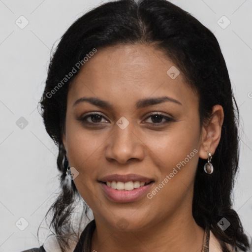 Joyful latino young-adult female with long  black hair and brown eyes