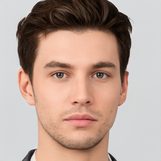 Neutral white young-adult male with short  brown hair and brown eyes