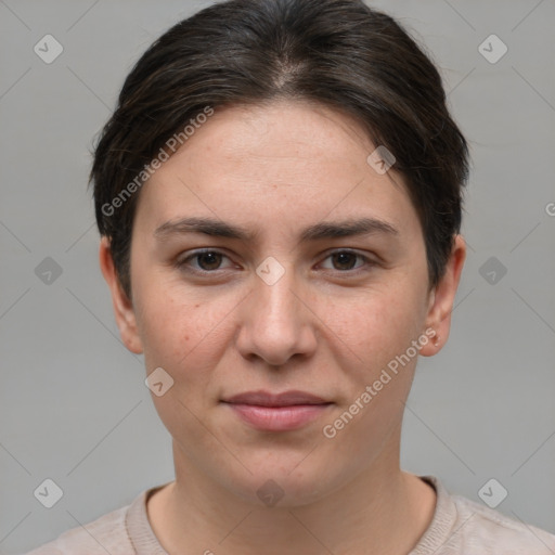 Joyful white young-adult female with short  brown hair and brown eyes