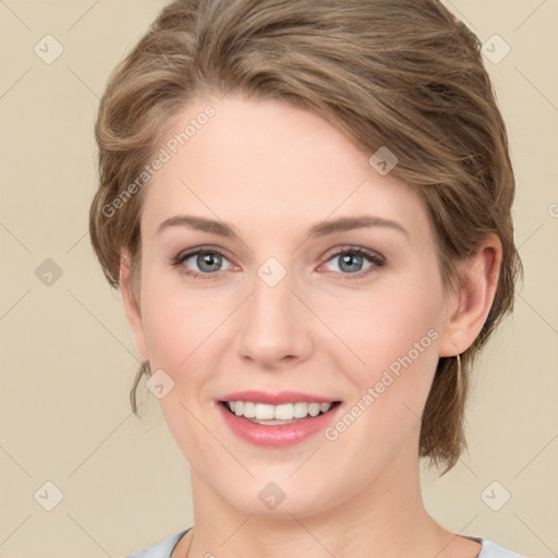 Joyful white young-adult female with medium  brown hair and green eyes