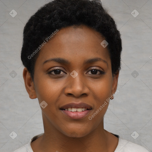 Joyful black young-adult female with short  black hair and brown eyes