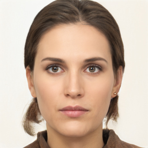 Neutral white young-adult female with medium  brown hair and brown eyes